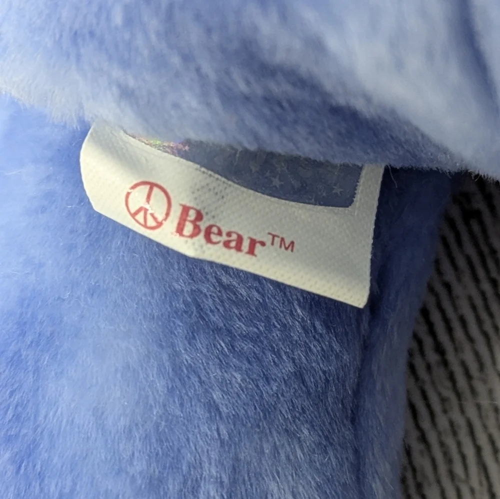 Ty Blue Plush Bear with Peace Emblem